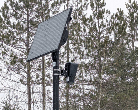 Flock Safety surveillance cameras monitoring a neighbourhood street