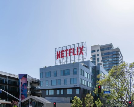 Netflix logo on a dim screen