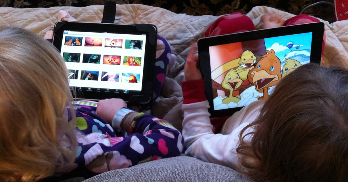 Child watching YouTube Kids on a tablet device